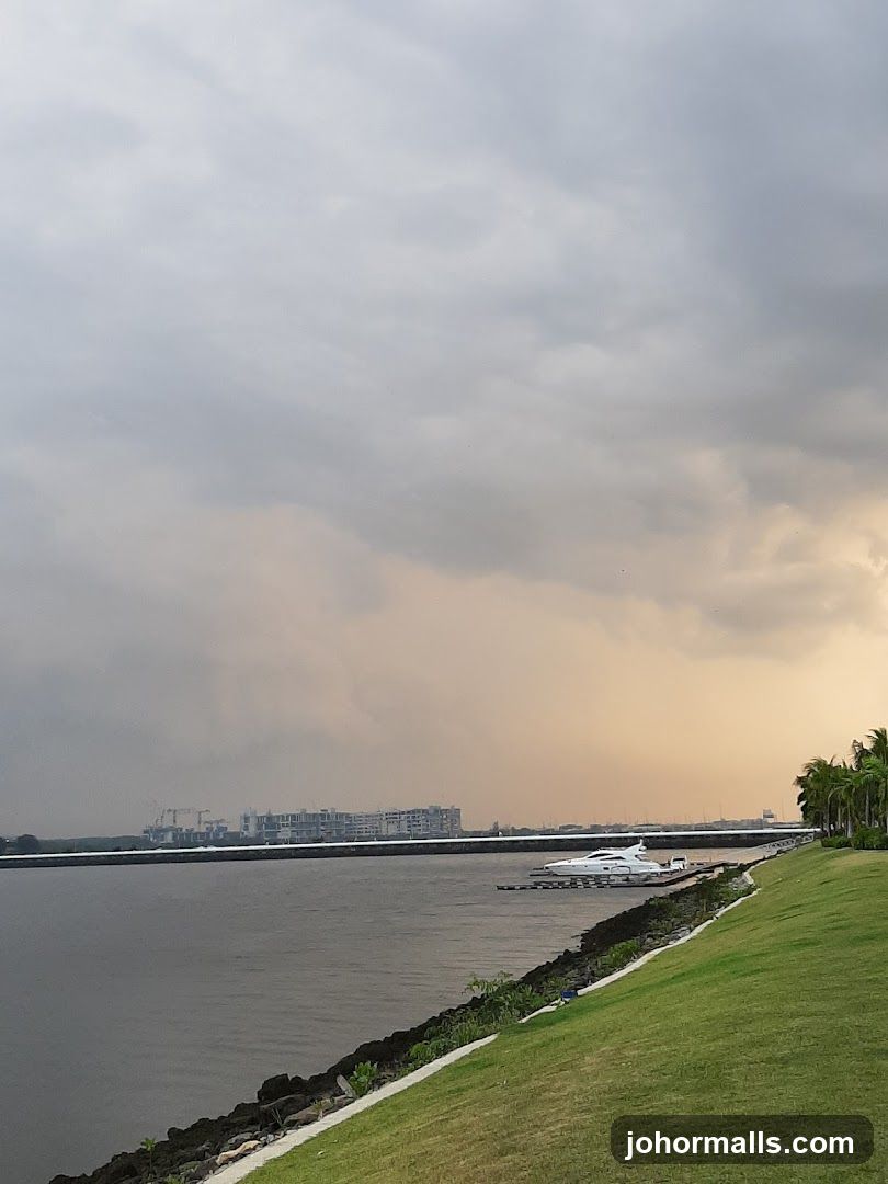 Waterfront View with Yacht and Cityscape