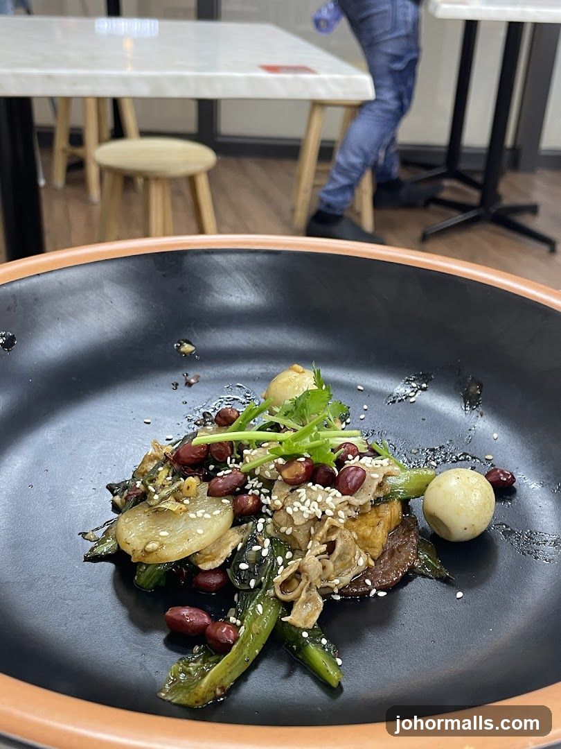 Spicy Stir-Fried Dish with Peanuts and Quail Eggs