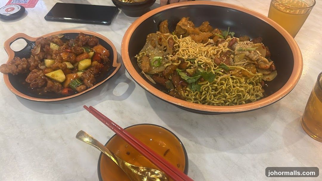 Two dishes of food on a table