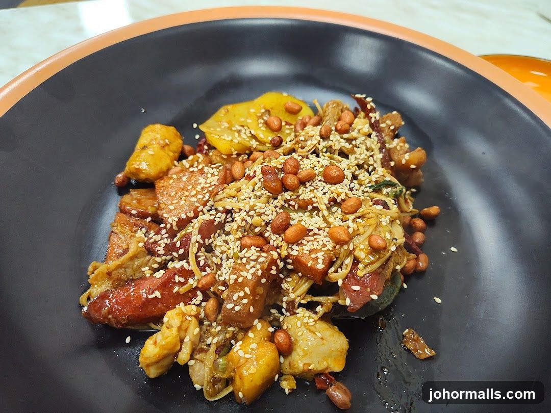 Spicy Stir-Fried Dish with Peanuts and Sesame Seeds