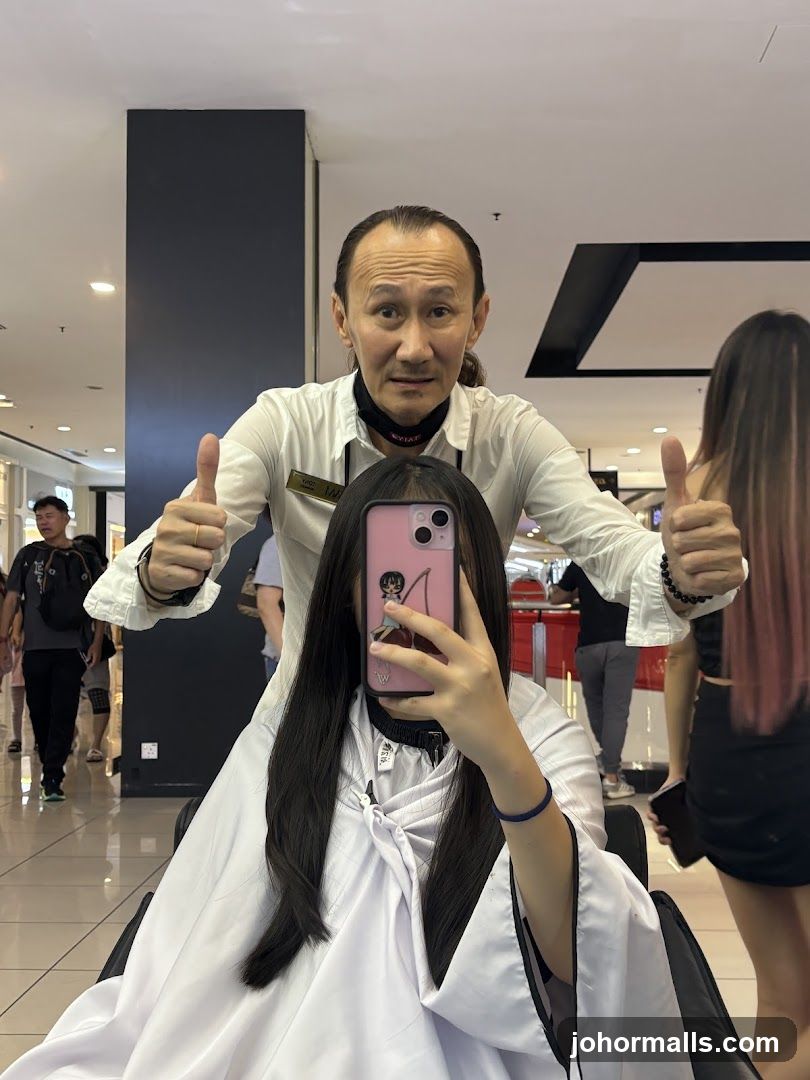 Hairdresser giving thumbs up