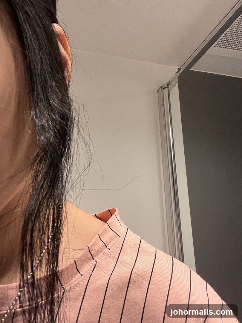 Woman's shoulder and hair