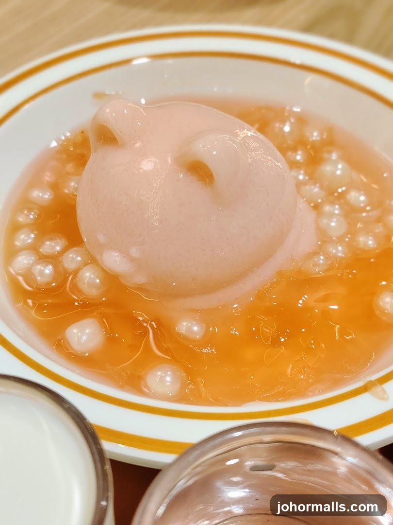 Dessert with Pink Pig-Shaped Topping