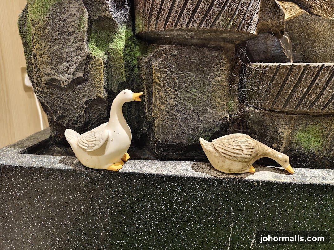 Duck Figurines on a Water Feature