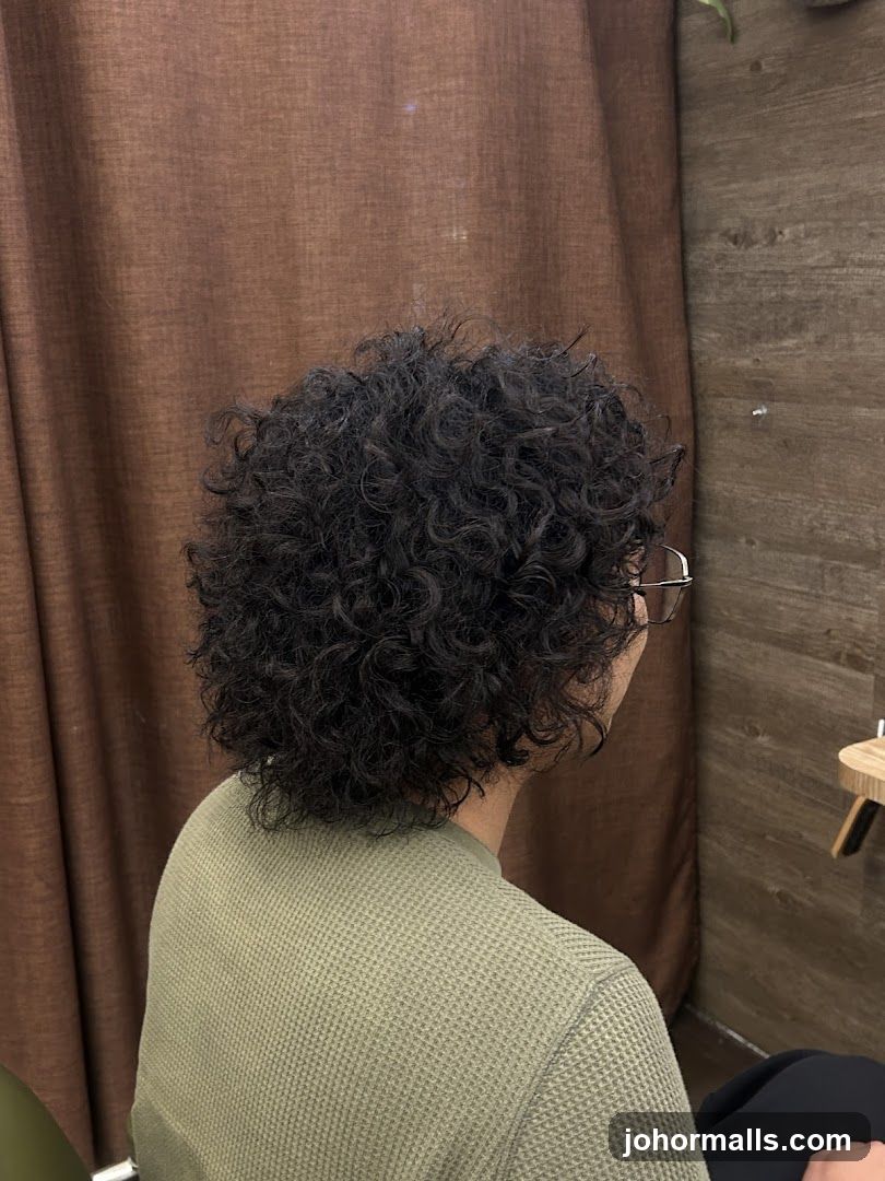 Person with curly hair