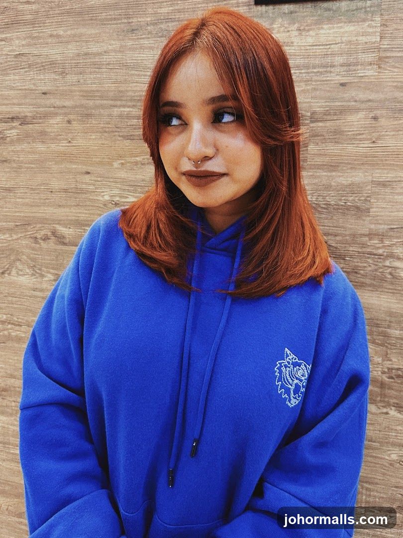 Woman in Blue Hoodie