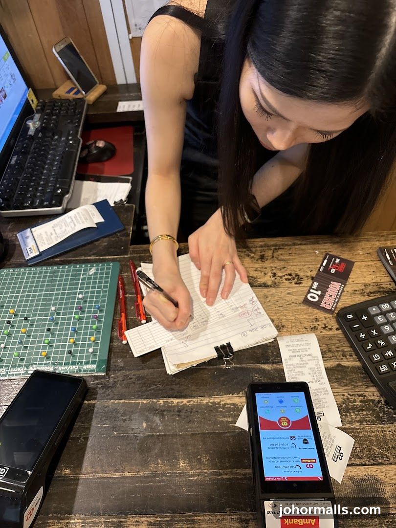 Cashier working at counter