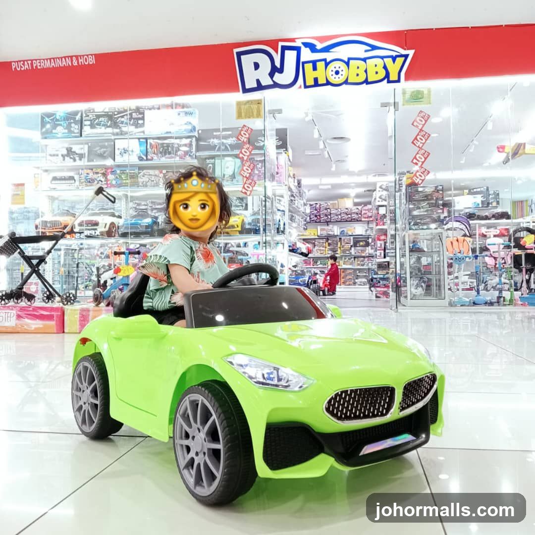 Child in a toy car at a hobby store
