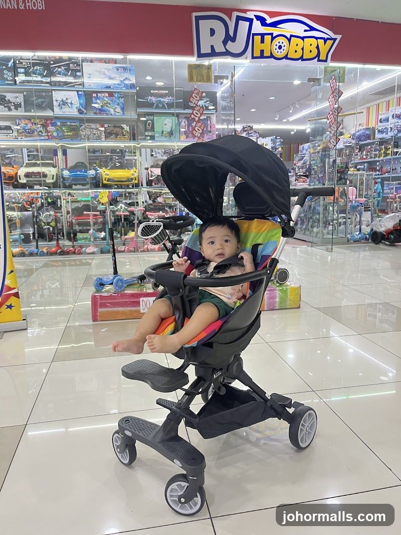 Baby in a stroller in a toy store