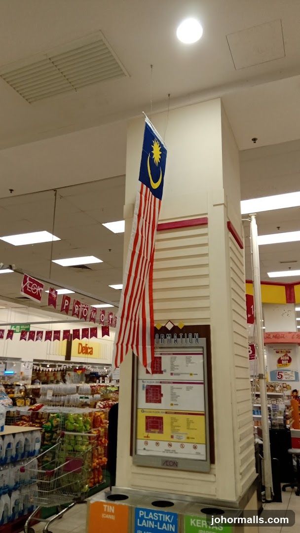 Mall Interior with Malaysian Flag and Information Board