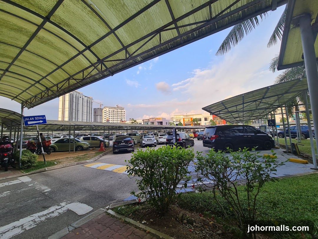 Parking Lot with Buildings in Background