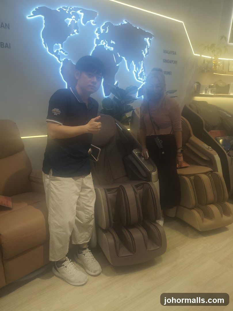 People posing with massage chairs