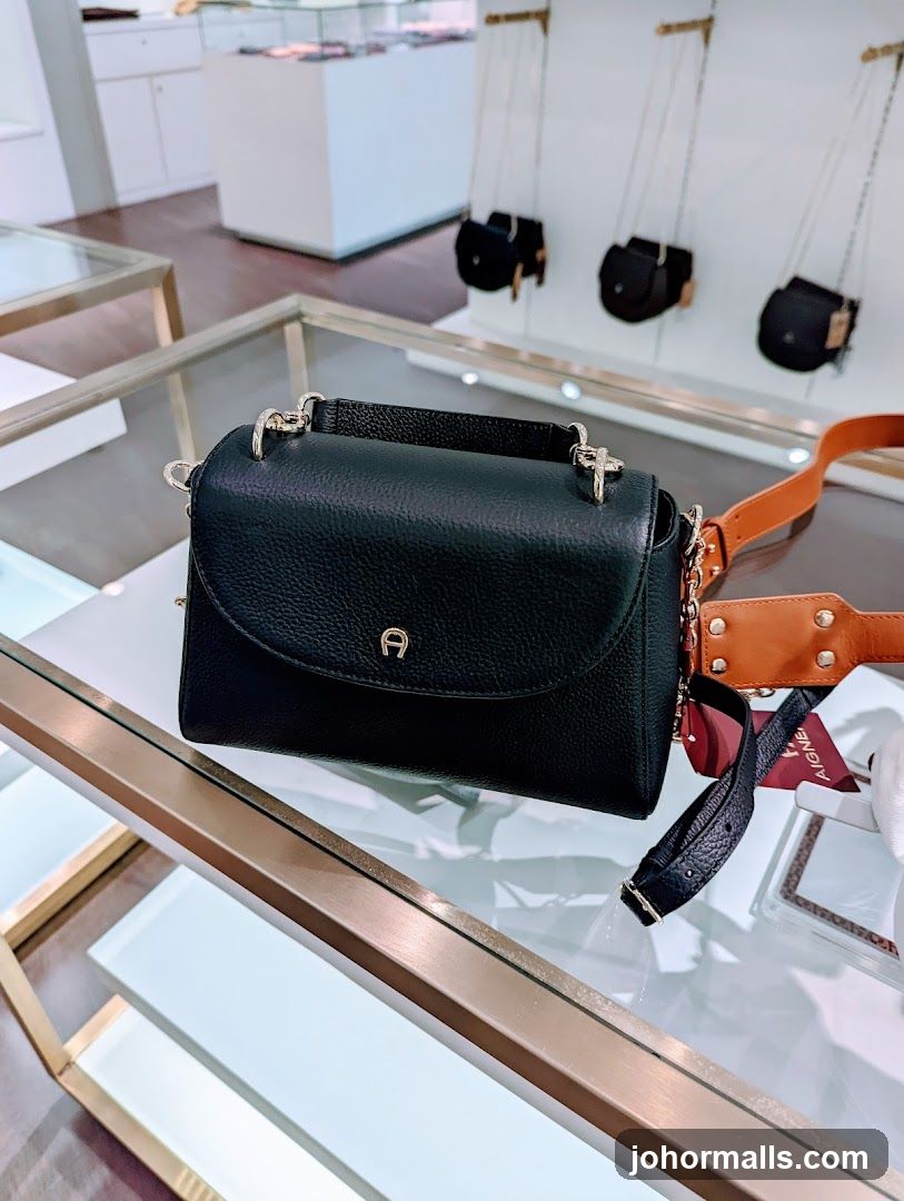Black Handbag with Gold Logo