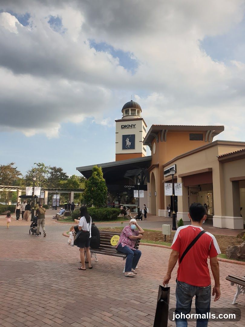 Outdoor shopping area with people