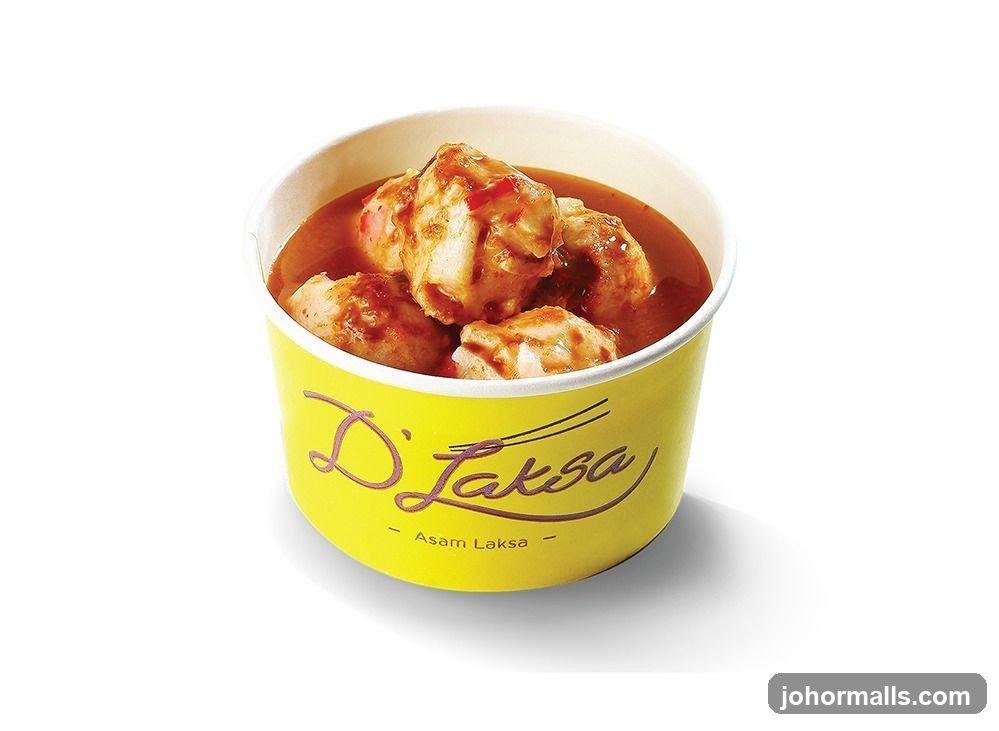 Asam Laksa in a Yellow Container