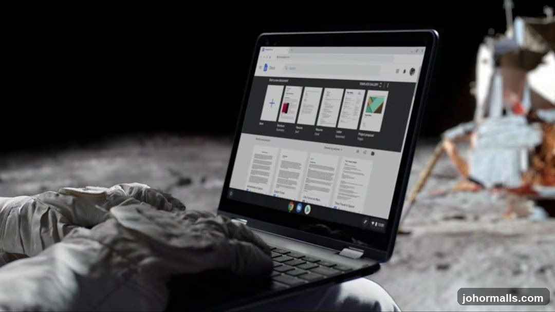 Astronaut using a laptop on the moon