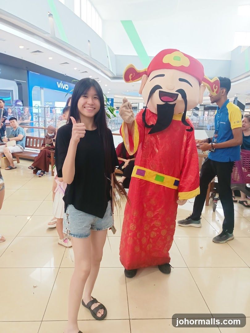 Woman Posing with Mascot