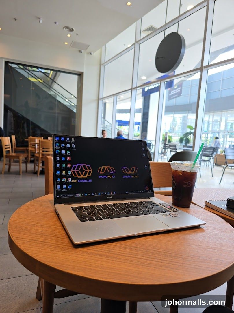 Laptop and Drink at Cafe