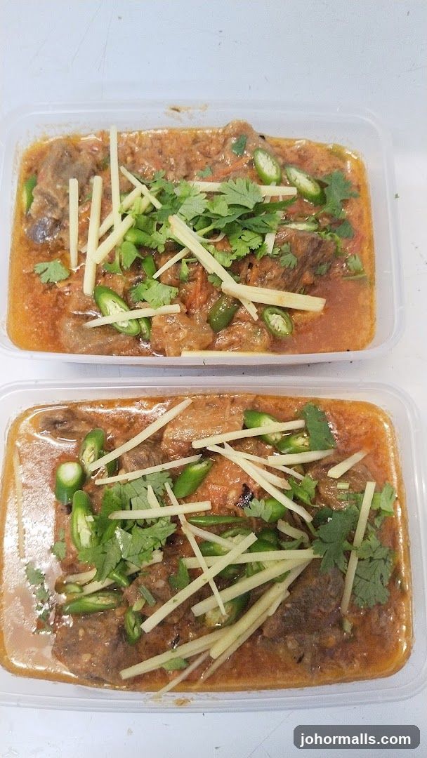 Two containers of curry