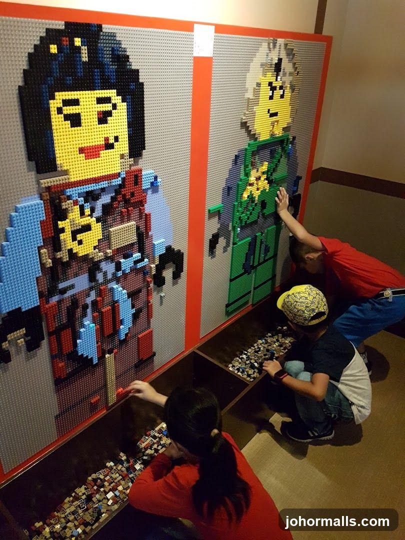 Children building with LEGOs