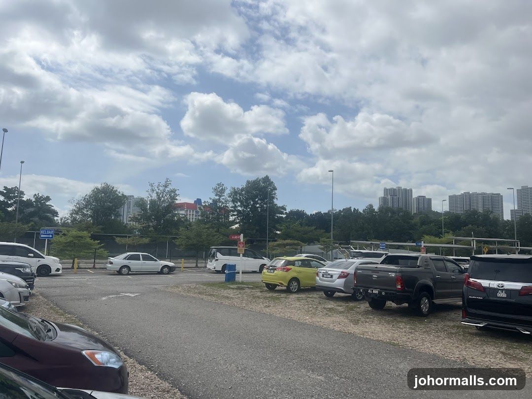 Parking Lot with Buildings in Background