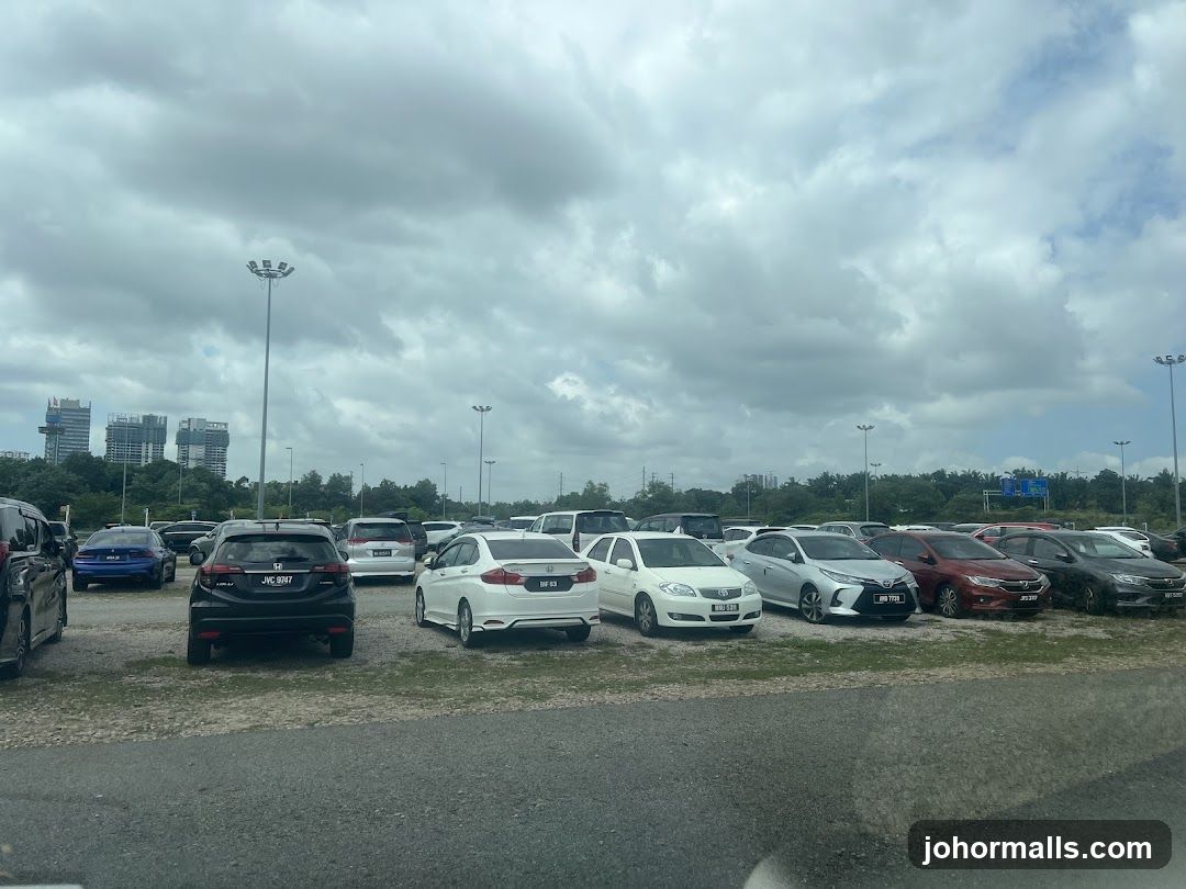 Parking Lot with Cars and Buildings