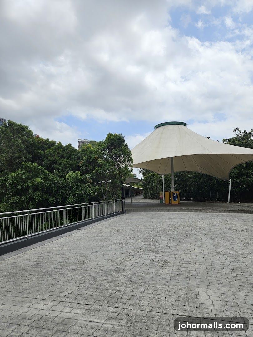 Outdoor walkway with canopy and greenery