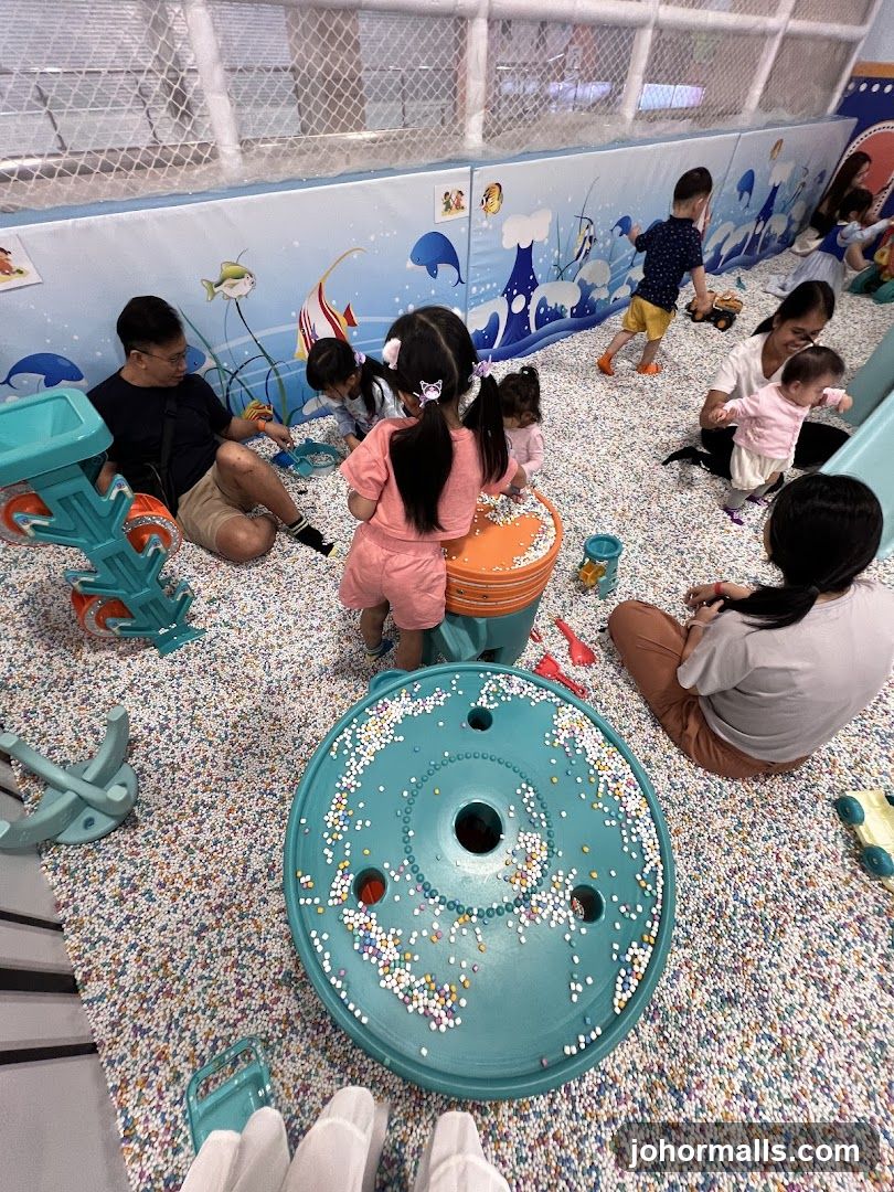 Children playing in a ball pit