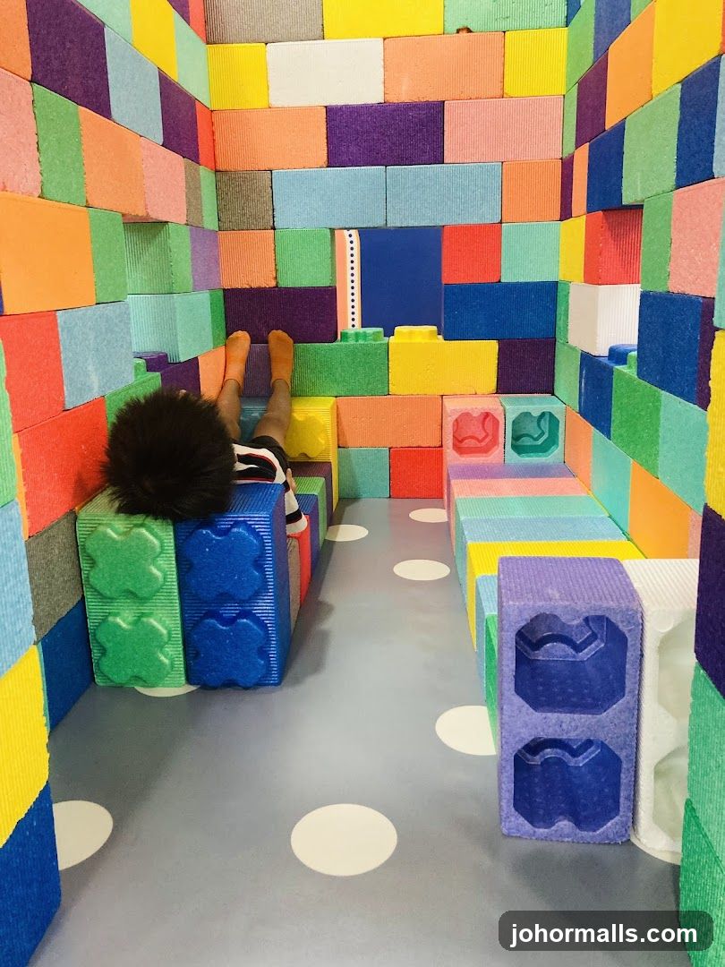 Child in a colorful block room