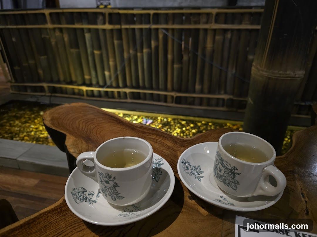 Two cups of tea on a wooden table