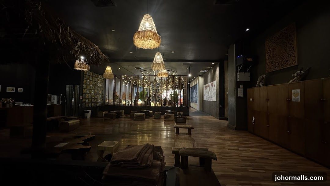 Interior of a dimly lit room with rustic seating and decor