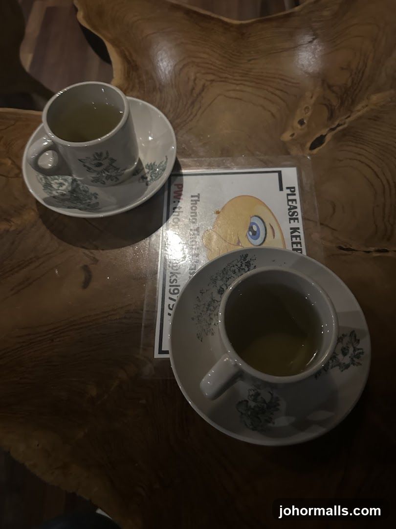 Two cups of tea on a wooden table