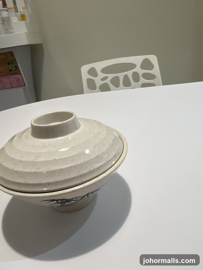 Covered bowl on a table
