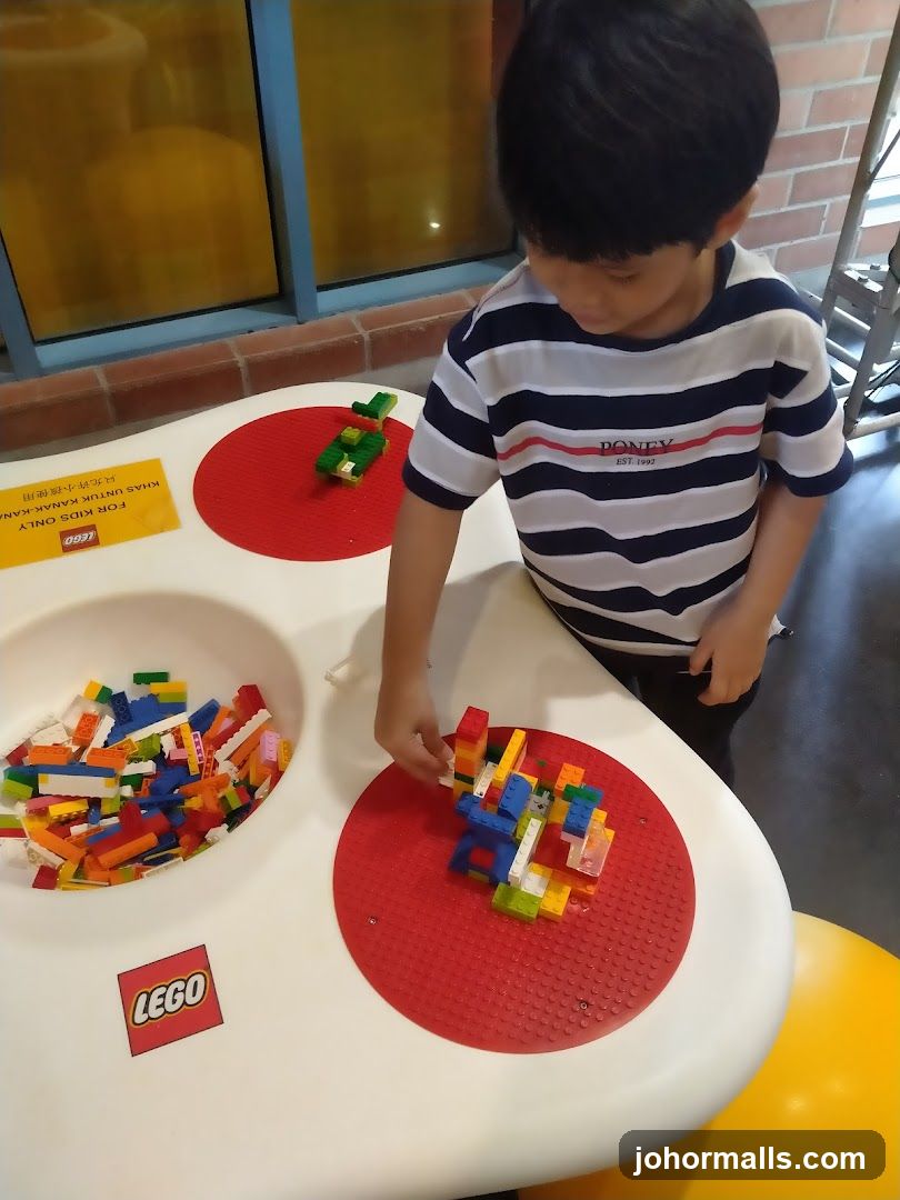 Child playing with LEGOs