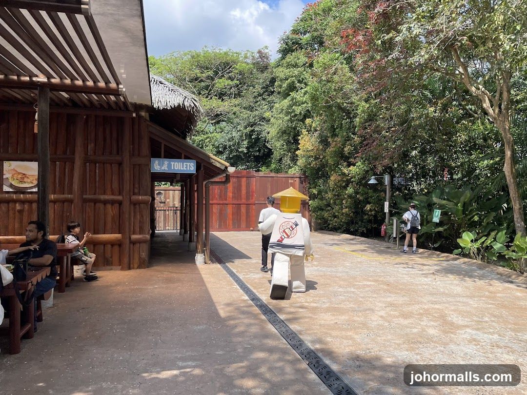 Theme Park Pathway with Toilets and Lego Character