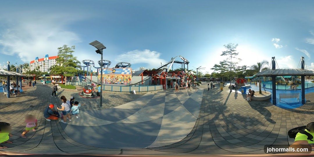 Amusement Park with Roller Coaster and Water Play Area