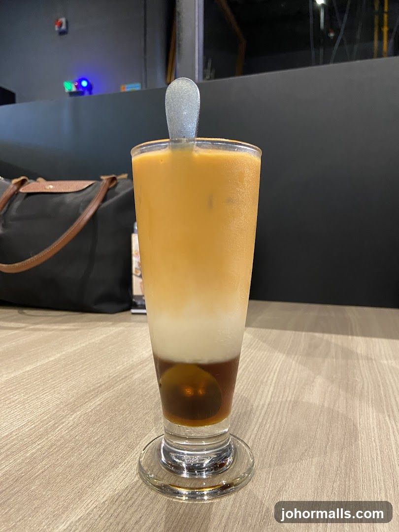Layered Drink with Spoon