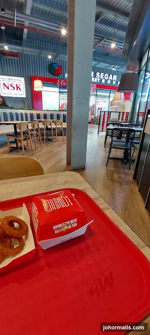 Burger and Onion Rings on a Tray