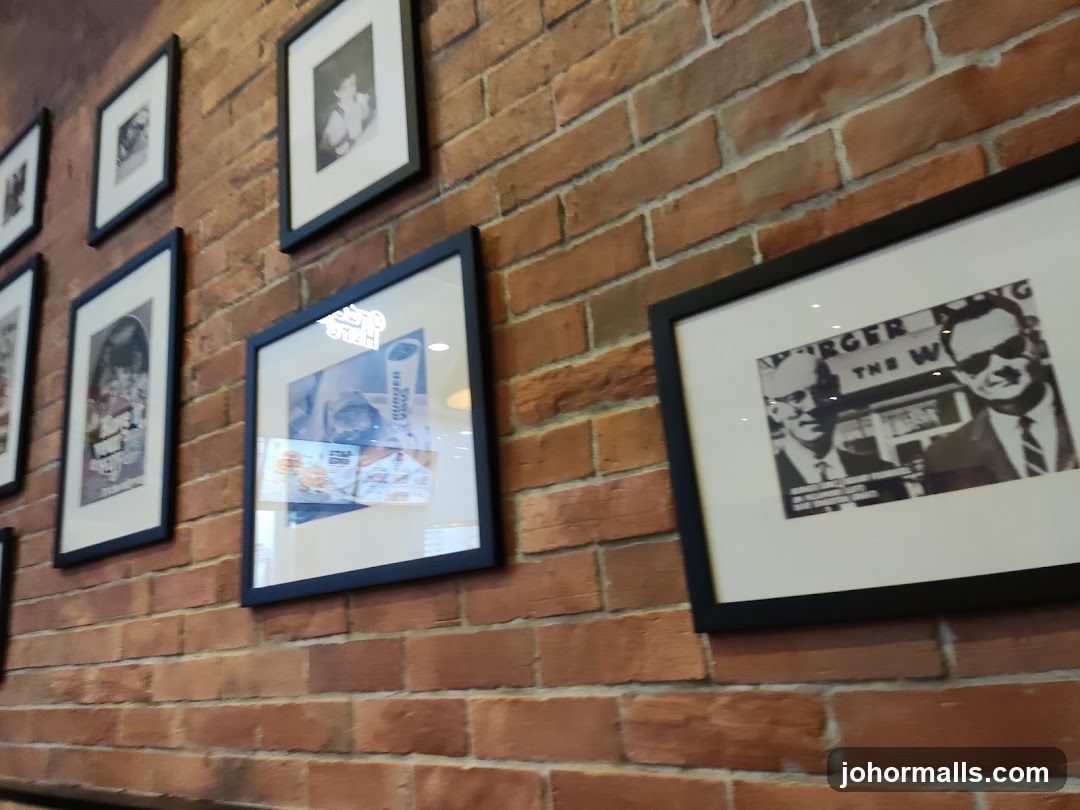 Framed Pictures on Brick Wall