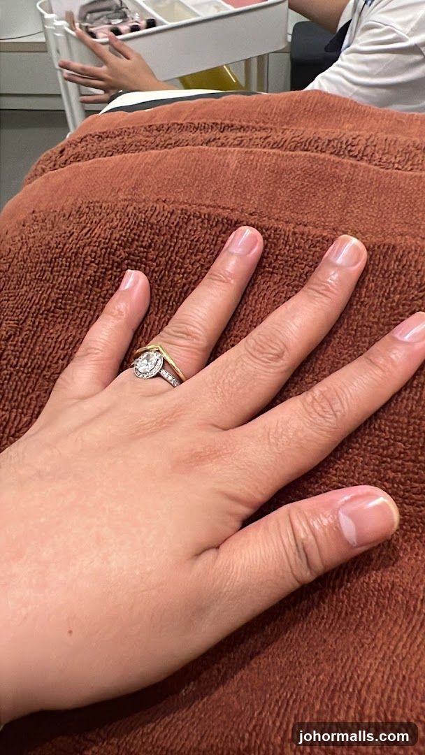 Hand with Ring on Towel