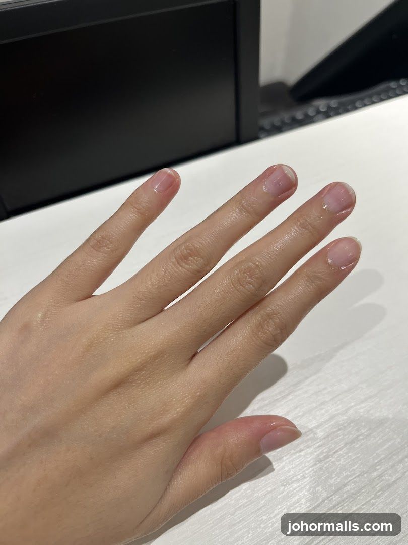 Hand with freshly manicured nails