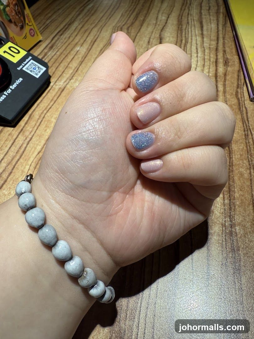 Manicured Hand with Bracelet