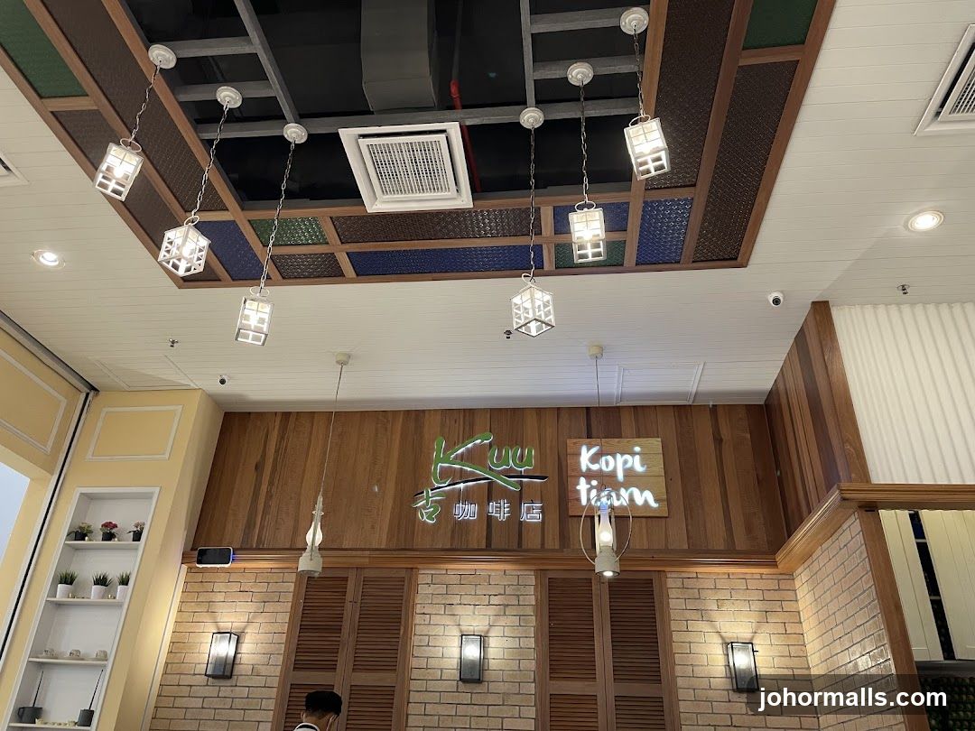 Interior of a cafe with decorative lighting and signage