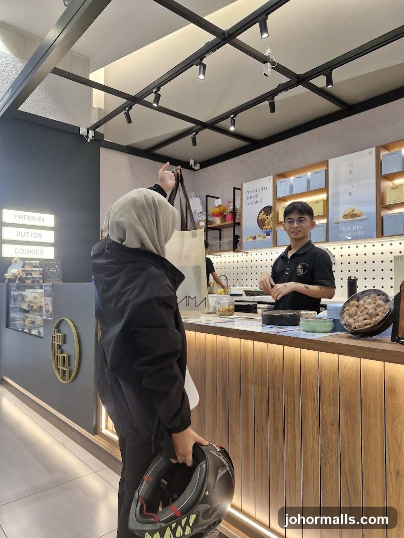 Bakery Counter with Staff and Customer