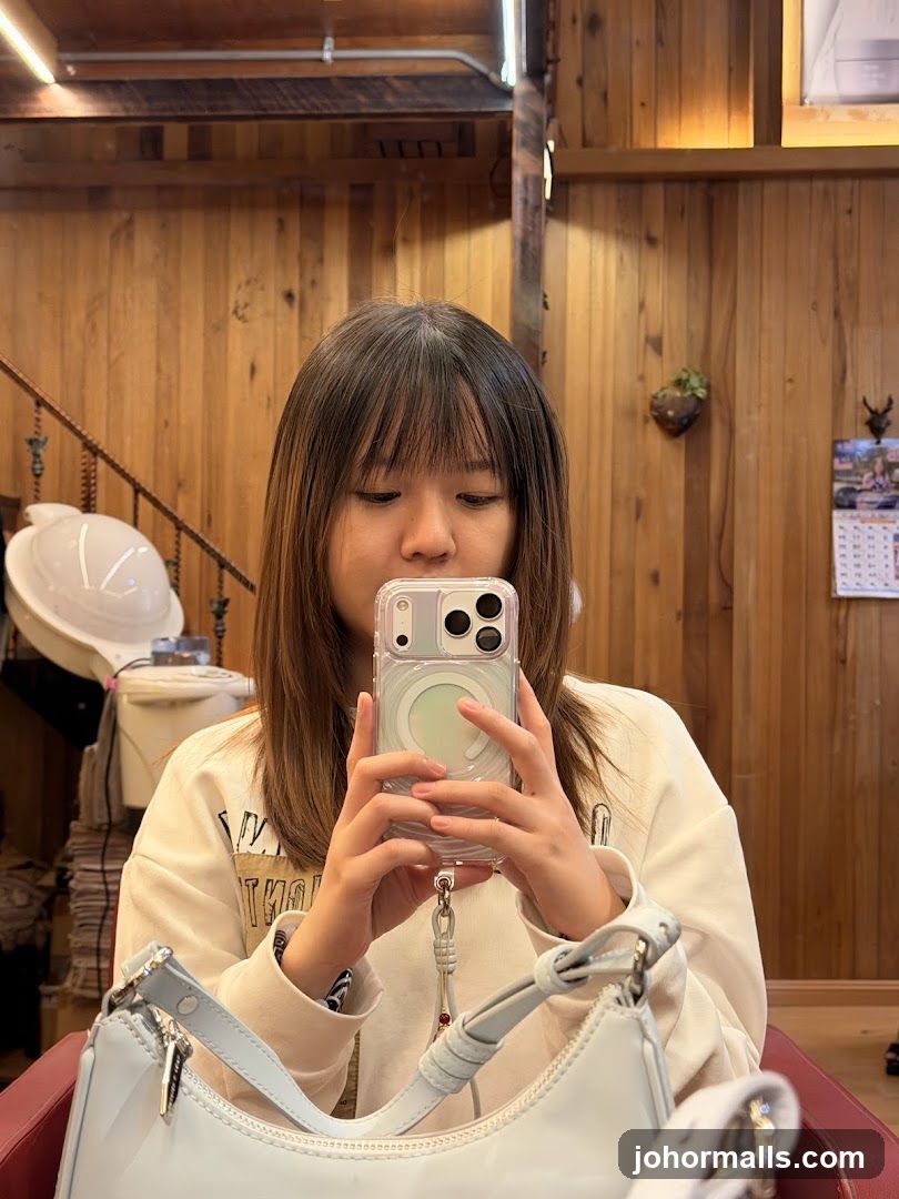 Woman taking a selfie in a salon