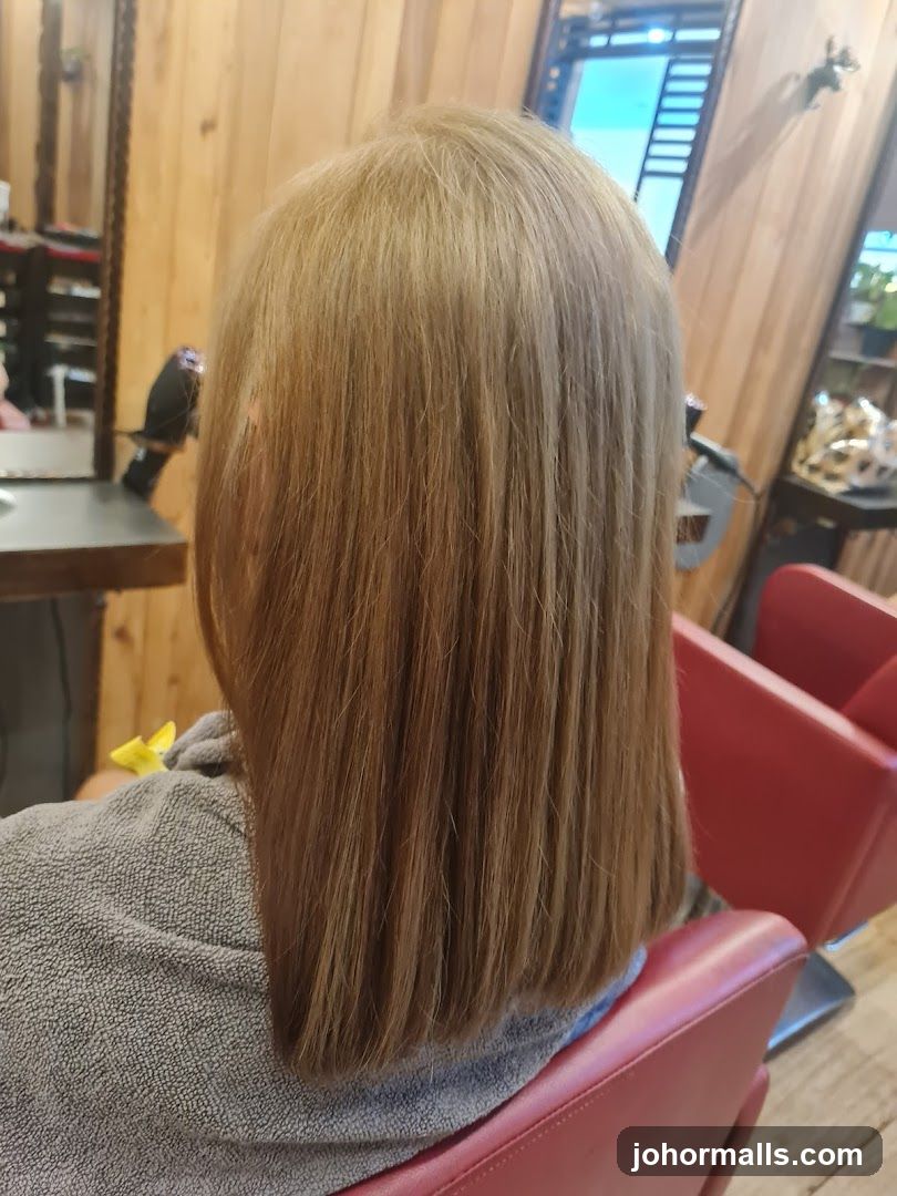 Woman with freshly cut brown hair