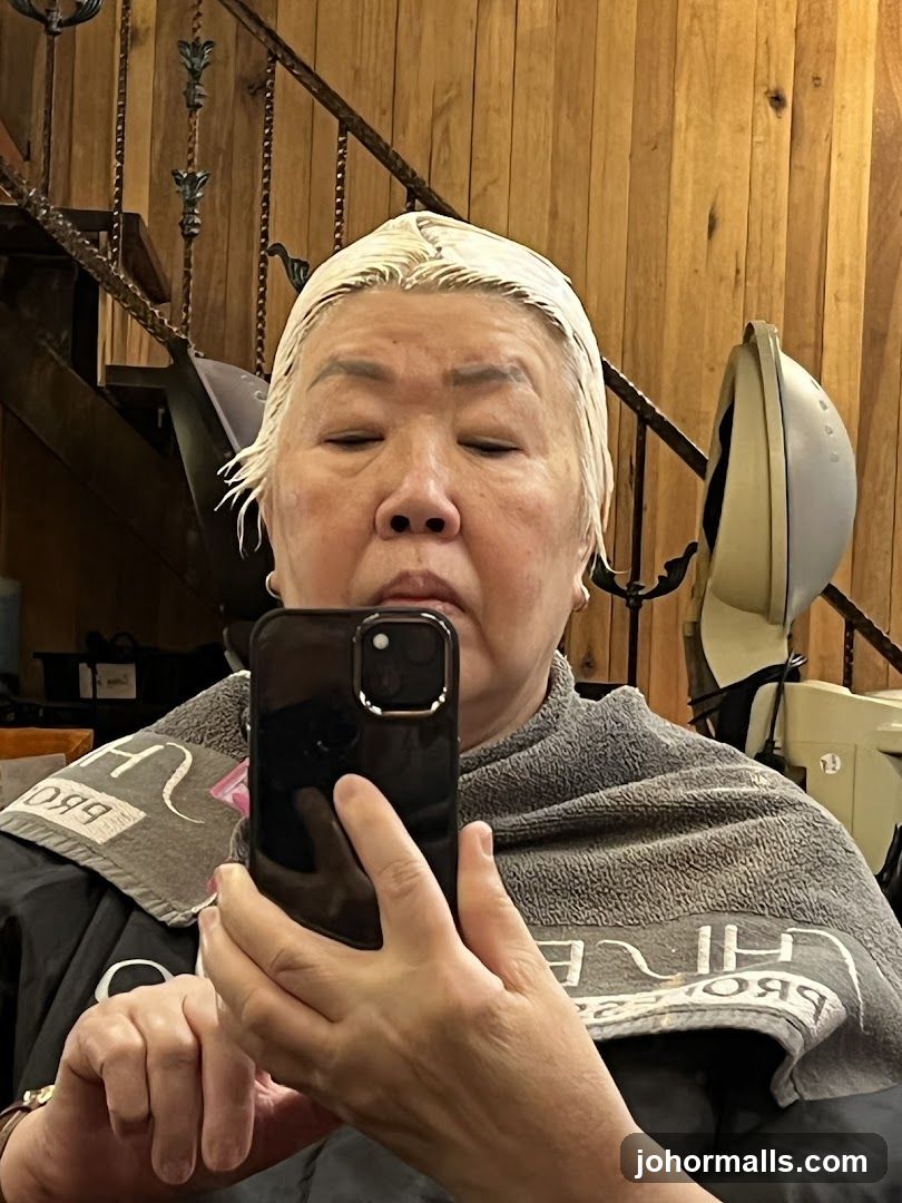 Woman with bleached hair taking a selfie