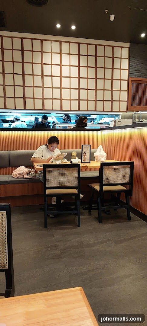 Restaurant Interior with Diners and Kitchen Staff