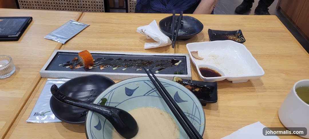 Table with leftover food and drinks