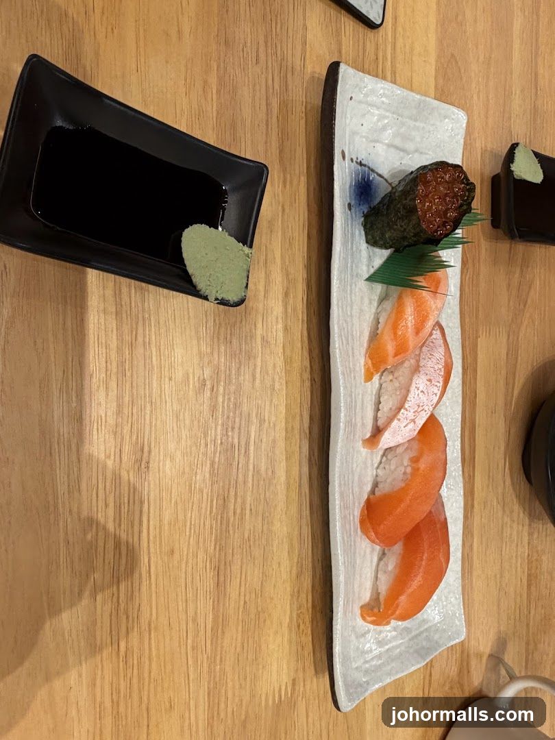Salmon Nigiri and Ikura Gunkan Maki